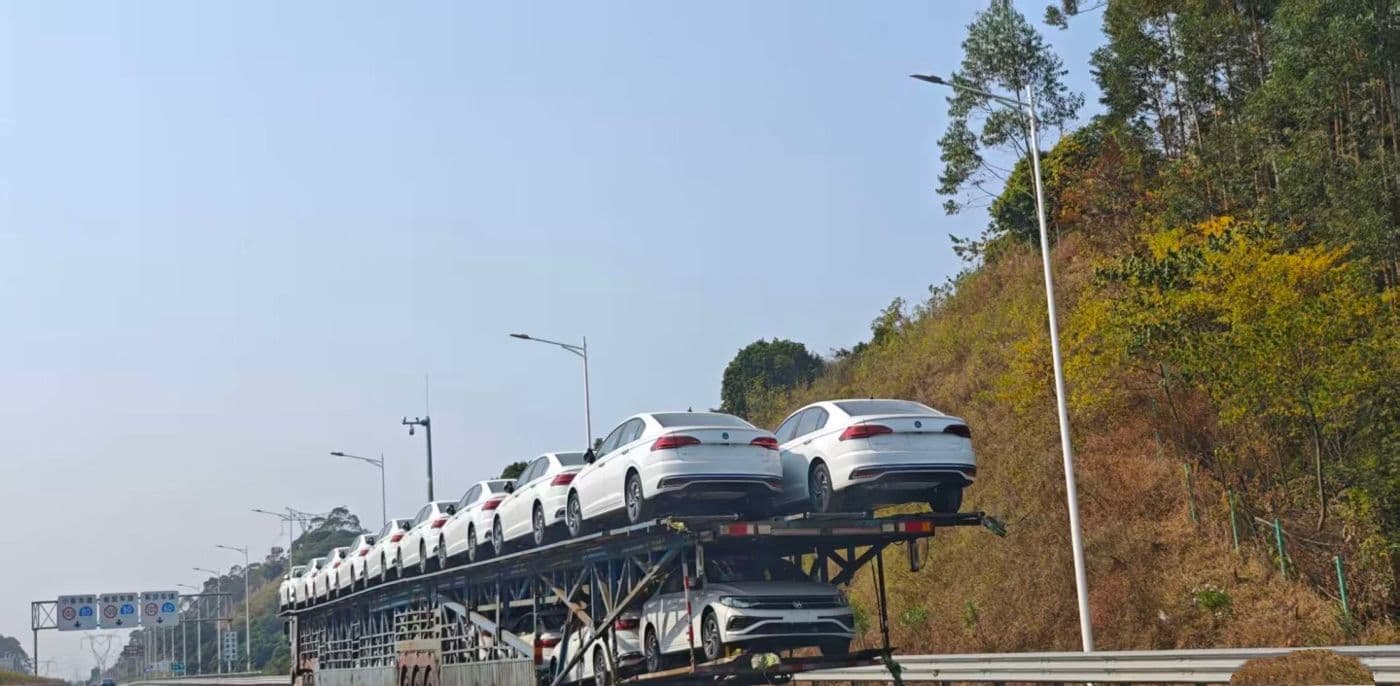 sedans on car carrier truck